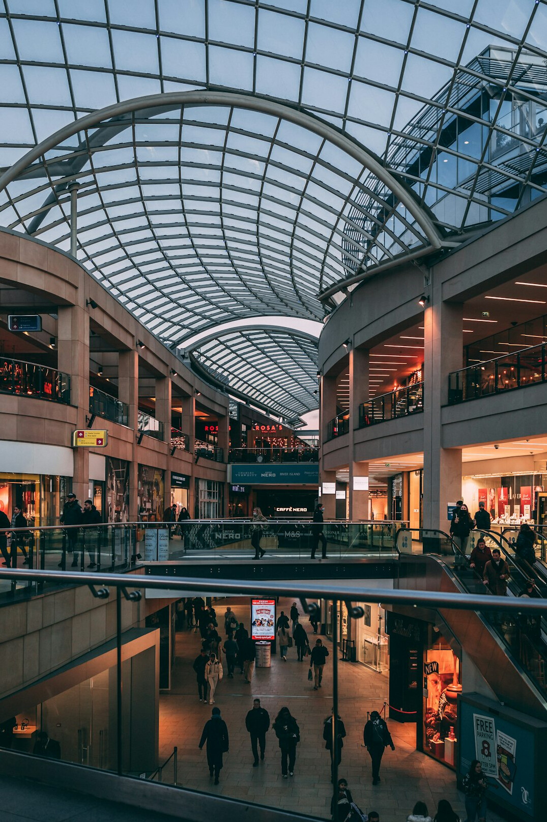 security guard watching crowd in mall