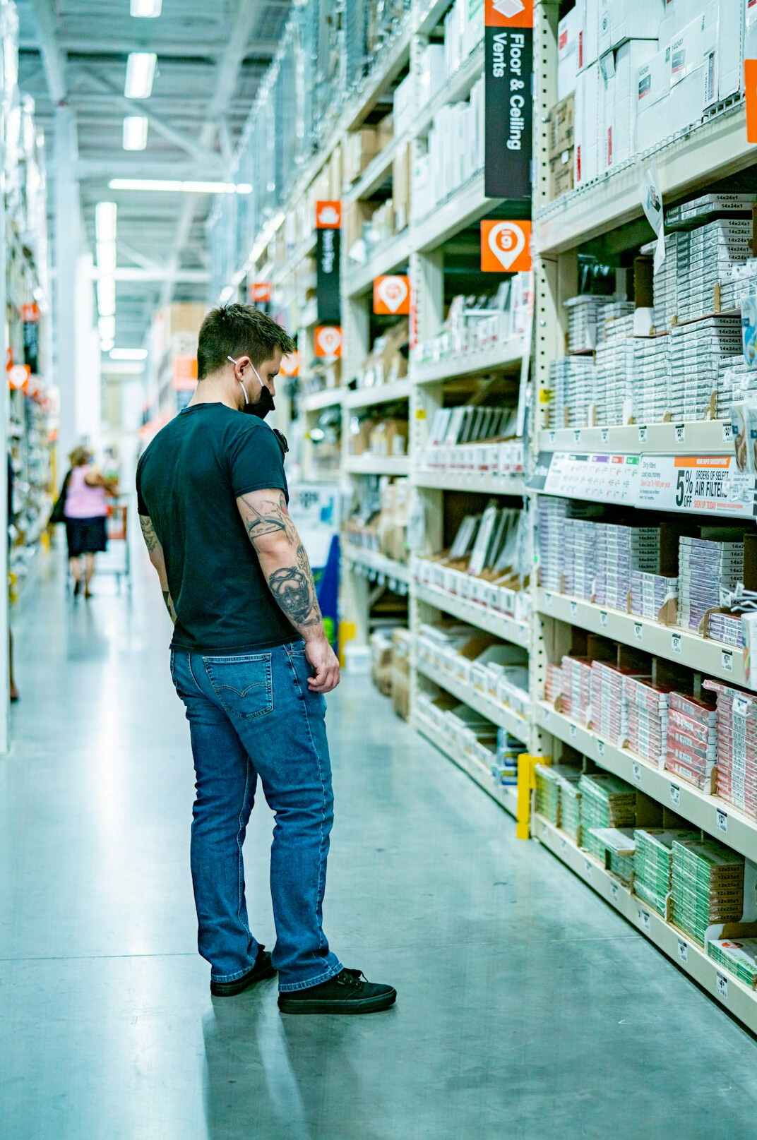 child in supermarket aisle