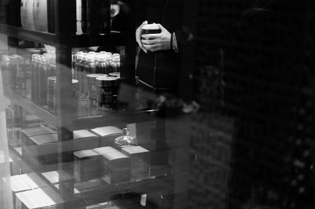 store detective watching surveillance