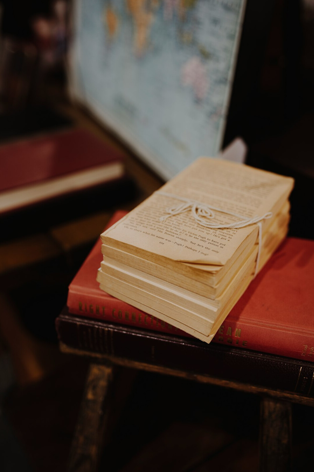 Stack of old archival documents tied with string